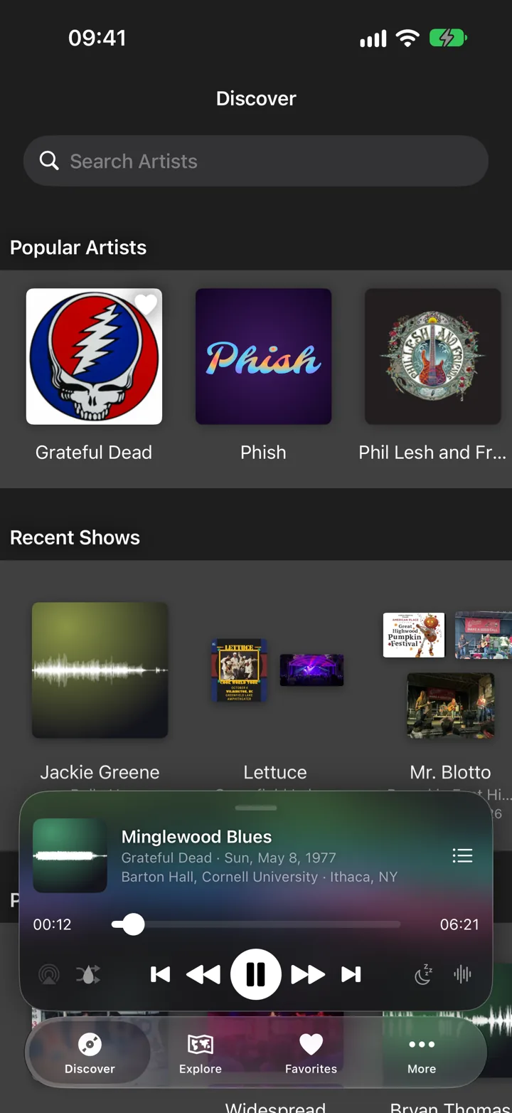 The Discover tab in the app, with rows of popular artists and recent shows and a show playing in the mini player.